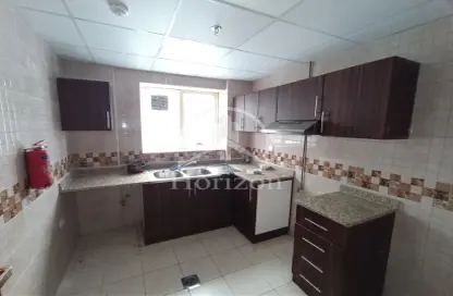 Kitchen image for: Apartment - 1 Bedroom - 2 Bathrooms for rent in Al Majaz 3 - Al Majaz - Sharjah, Image 1