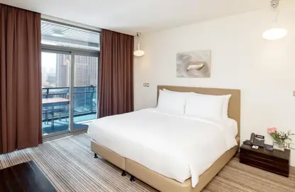 Apartment - 1 Bedroom - 2 Bathrooms for rent in Radisson Blu Hotel Apartments - Dubai Silicon Oasis - Dubai