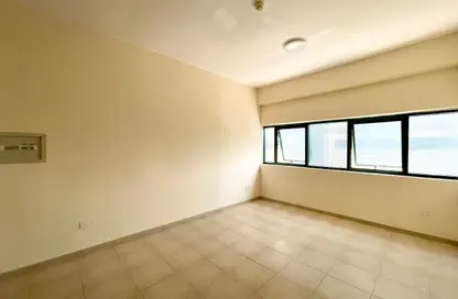 Apartment - Studio - 1 Bathroom for rent in Al Shaiba Building - Dubai Outsource Zone - Dubai