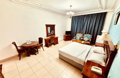 Apartment - Studio - 1 Bathroom for rent in Muraijeb Tower - Hamdan Street - Abu Dhabi