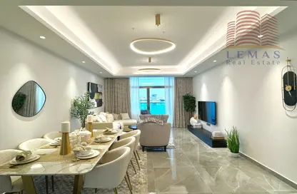 Living / Dining Room image for: Apartment - 2 Bedrooms - 3 Bathrooms for sale in Ajman Creek Towers - Al Rashidiya 1 - Al Rashidiya - Ajman, Image 1