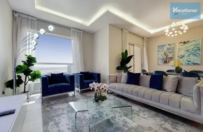 Living Room image for: Apartment - 2 Bedrooms - 2 Bathrooms for rent in Shams 2 - Shams - Jumeirah Beach Residence - Dubai, Image 1