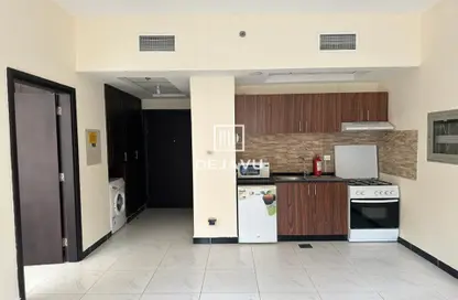 Kitchen image for: Apartment - 1 Bedroom - 2 Bathrooms for rent in Kensington Manor - Jumeirah Village Circle - Dubai, Image 1