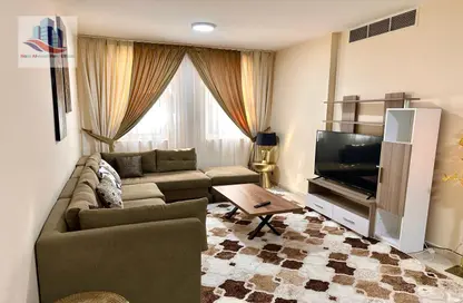 Living Room image for: Apartment - 1 Bedroom - 2 Bathrooms for rent in Al Majaz 3 - Al Majaz - Sharjah, Image 1
