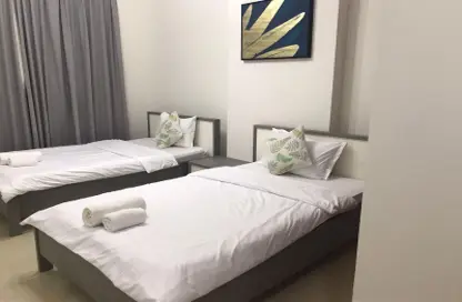 صورة لـ غرفة- غرفة النوم شقة - 2 غرف نوم - 2 حمامات للايجار في ا ق 11 - دبي الجنوب (مركز دبي العالمي) - دبي ، صورة رقم 1