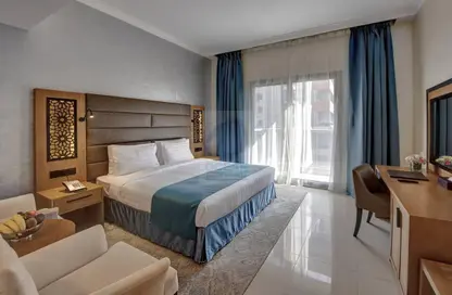 صورة لـ غرفة- غرفة النوم النزل و الشقق الفندقية - 1 حمام للايجار في كلاس للشقق الفندقيه - برشا هايتس (تيكوم) - دبي ، صورة رقم 1
