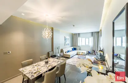 Living / Dining Room image for: Apartment - 3 Bedrooms - 4 Bathrooms for sale in DAMAC Majestine - Business Bay - Dubai, Image 1
