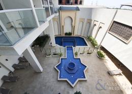 Pool image for: Studio - 1 bathroom for rent in Chaimaa Premiere - Jumeirah Village Circle - Dubai, Image 1