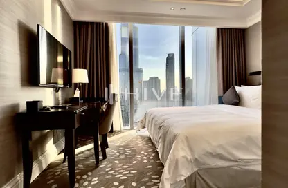 صورة لـ غرفة- غرفة النوم شقة - 3 غرف نوم - 5 حمامات للايجار في جادة كمبينسكي - دبي وسط المدينة - دبي ، صورة رقم 1