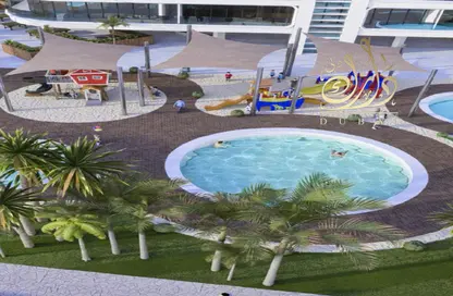 Pool image for: Apartment - 2 Bedrooms - 3 Bathrooms for sale in The Central Downtown - Arjan - Dubai, Image 1