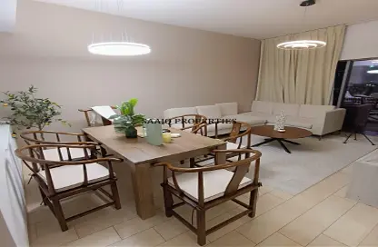 Living / Dining Room image for: Apartment - 2 Bedrooms - 2 Bathrooms for sale in Genesis by Meraki - Arjan - Dubai, Image 1