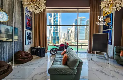 صورة لـ غرفة المعيشة شقة - غرفة نوم - 2 حمامات للبيع في برج نورا - مدينة الحبتور - الخليج التجاري - دبي ، صورة رقم 1