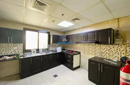 Apartment - 1 Bedroom - 2 Bathrooms for rent in Al Zubaidi Residence - District 14 - Jumeirah Village Circle - Dubai