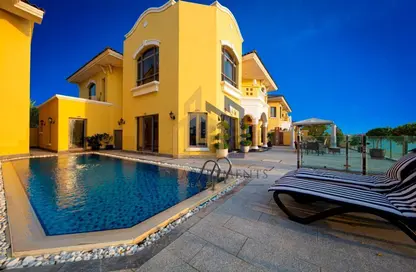 Pool image for: Villa - 5 Bedrooms - 5 Bathrooms for sale in Garden Homes Frond E - Garden Homes - Palm Jumeirah - Dubai, Image 1