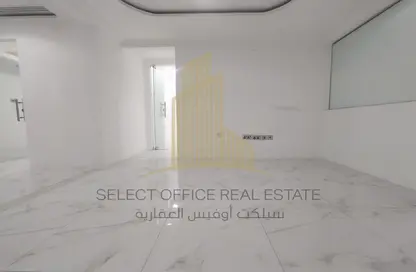 Empty Room image for: Office Space - Studio - 2 Bathrooms for rent in Dalma Residence - Hamdan Street - Abu Dhabi, Image 1