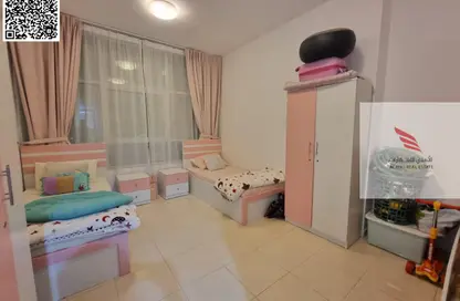 Apartment - 2 Bedrooms - 3 Bathrooms for sale in Orient Tower 1 - Orient Towers - Al Bustan - Ajman