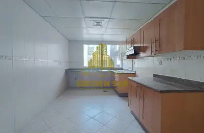 Kitchen image for: Apartment - 2 Bedrooms - 2 Bathrooms for rent in Khalidiya Twin Towers - Al Khalidiya - Abu Dhabi, Image 1