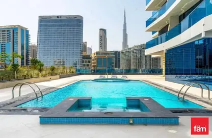 صورة لـ حوض سباحة شقة - 1 حمام للبيع في ويفز تاور - الخليج التجاري - دبي ، صورة رقم 1