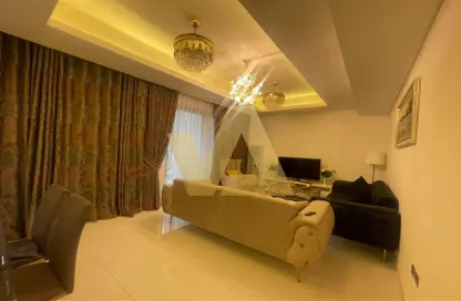 Living Room image for: Townhouse - 3 Bedrooms - 5 Bathrooms for rent in Aster - Damac Hills 2 - Dubai, Image 1