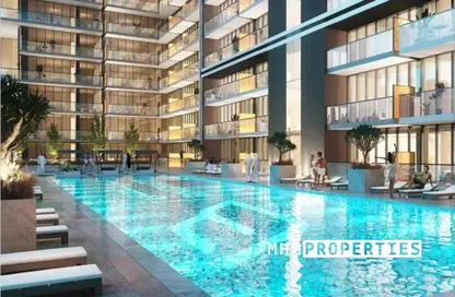 Pool image for: Apartment - 2 Bedrooms - 2 Bathrooms for sale in Binghatti Amber - Jumeirah Village Circle - Dubai, Image 1