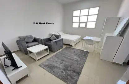 Living Room image for: Apartment - 1 Bathroom for rent in Khalifa City - Abu Dhabi, Image 1