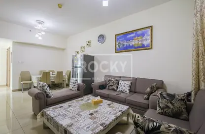 Living Room image for: Apartment - 3 Bedrooms - 4 Bathrooms for sale in Centrium Tower 4 - Centrium Towers - Dubai Production City (IMPZ) - Dubai, Image 1