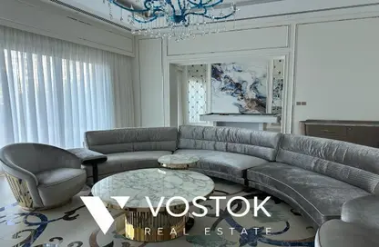 Living Room image for: Apartment - 4 Bedrooms - 5 Bathrooms for sale in Dream Palm Residence - The Crescent - Palm Jumeirah - Dubai, Image 1