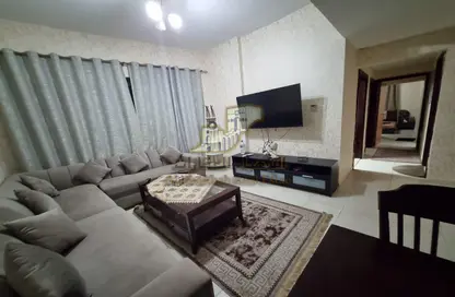صورة لـ غرفة المعيشة شقة - 2 غرف نوم - 2 حمامات للايجار في أبراج الياسمين - جاردن سيتي - عجمان ، صورة رقم 1