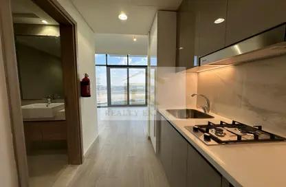 صورة لـ مطبخ شقة - 1 حمام للايجار في عزيزي ريفيرا - ميدان واحد - ميدان - دبي ، صورة رقم 1