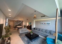 Living Room image for: Townhouse - 4 bedrooms - 6 bathrooms for sale in Gardenia Townhomes - Wasl Gate - Dubai, Image 1