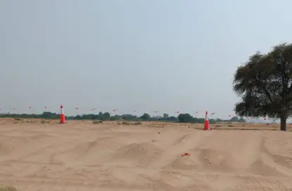 أرض - استوديو للبيع في ضاحية الرويضات - الشارقة