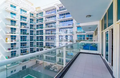 Balcony image for: Apartment - 1 Bedroom - 2 Bathrooms for rent in Glitz 3 - Glitz - Dubai Studio City - Dubai, Image 1