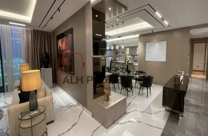 صورة لـ غرفة المعيشة / غرفة الطعام شقة - 4 غرف نوم - 6 حمامات للبيع في زا اس تاور - مدينة دبي للانترنت - دبي ، صورة رقم 1
