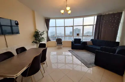 شقة - غرفة نوم - 2 حمامات للبيع في أورينت تاور 1 - أورينت تاور - البستان - عجمان