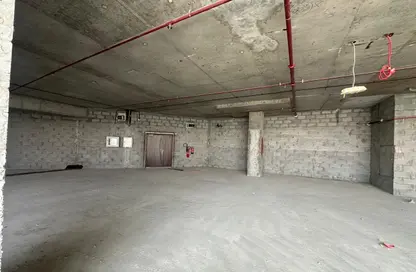 Office Space - Studio - 3 Bathrooms for sale in Schon Business Park - Dubai Investment Park (DIP) - Dubai