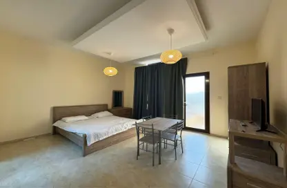 Room / Bedroom image for: Apartment - 1 Bathroom for rent in Complex 17 - Khalifa City - Abu Dhabi, Image 1