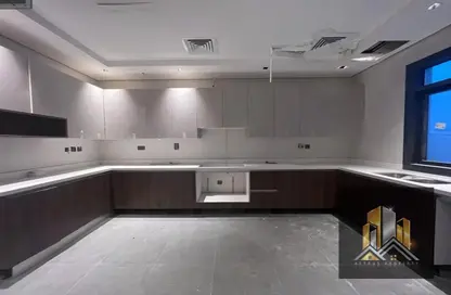 Kitchen image for: Apartment - 1 Bedroom - 2 Bathrooms for rent in Khalifa City A Villas - Khalifa City A - Khalifa City - Abu Dhabi, Image 1
