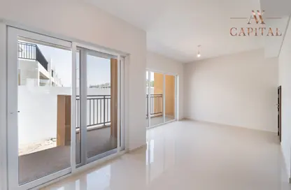 Townhouse - 3 Bedrooms - 4 Bathrooms for sale in Aknan Villas - Victoria - Damac Hills 2 - Dubai