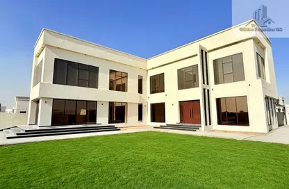 Villa - 5 Bedrooms - 7 Bathrooms for rent in Wadi Alshabak - Dubai