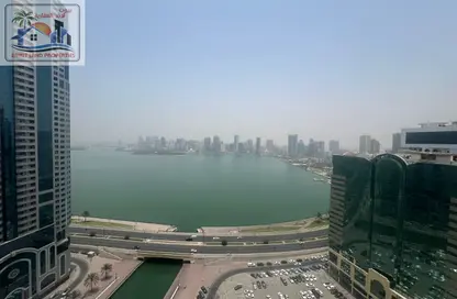 Apartment - 2 Bedrooms - 2 Bathrooms for rent in Al Shahid Tower - Al Qasba - Sharjah