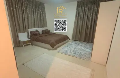شقة - غرفة نوم - 2 حمامات للايجار في أورينت تاور 1 - أورينت تاور - البستان - عجمان
