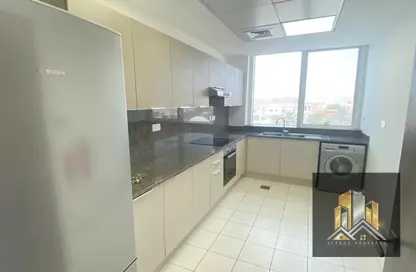 Kitchen image for: Apartment - 2 Bedrooms - 3 Bathrooms for rent in Villa Compound - Khalifa City - Abu Dhabi, Image 1