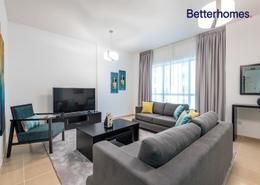 Living Room image for: Apartment - 3 bedrooms - 4 bathrooms for sale in Shams 1 - Shams - Jumeirah Beach Residence - Dubai, Image 1