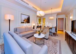 صورةغرفة المعيشة / غرفة الطعام لـ: شقة - 1 غرفة نوم - 2 حمامات للكراء في فندق العنوان - بوليفارد - دبي وسط المدينة - دبي, صورة 1