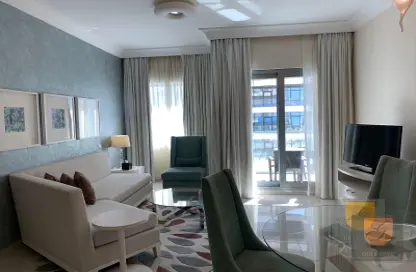 صورة لـ غرفة المعيشة شقة - غرفة نوم - 2 حمامات للايجار في ذا سيجنتشر - برج خليفة - دبي وسط المدينة - دبي ، صورة رقم 1