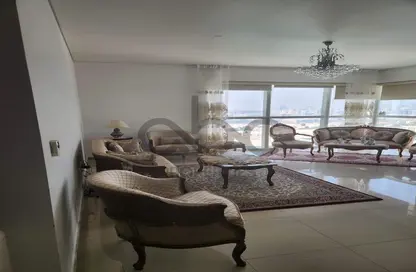 Living Room image for: Apartment - 2 Bedrooms - 3 Bathrooms for sale in RAK Tower - Marina Square - Al Reem Island - Abu Dhabi, Image 1