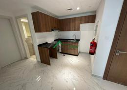 Kitchen image for: Duplex - 2 bedrooms - 3 bathrooms for sale in Oasis 1 - Oasis Residences - Masdar City - Abu Dhabi, Image 1