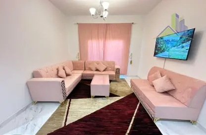 Living Room image for: Apartment - 1 Bedroom - 2 Bathrooms for rent in Al Rashidiya Towers - Al Rashidiya - Ajman Downtown - Ajman, Image 1