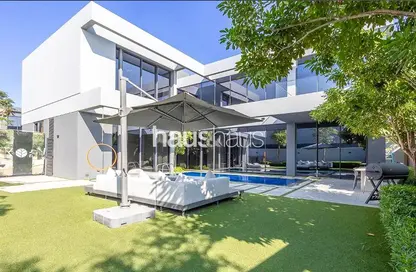 Outdoor House image for: Villa - 5 Bedrooms - 5 Bathrooms for sale in Jouri Hills - Jumeirah Golf Estates - Dubai, Image 1