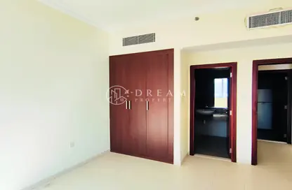Room / Bedroom image for: Apartment - 1 Bedroom - 2 Bathrooms for rent in Art 8 - Barsha Heights (Tecom) - Dubai, Image 1
